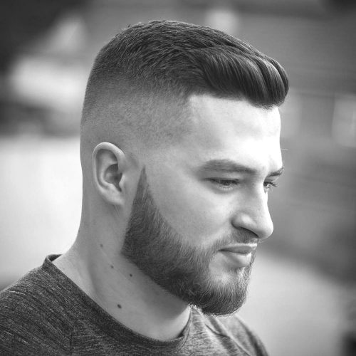 A man is showing his Crew Cut - Short Hairstyle for Men