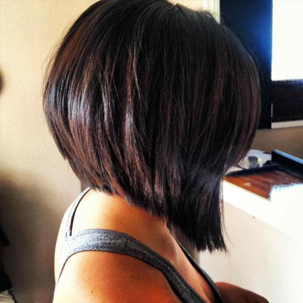 A women in grey tank top showing the side view of her Bob cut - short hairstyles for American Women