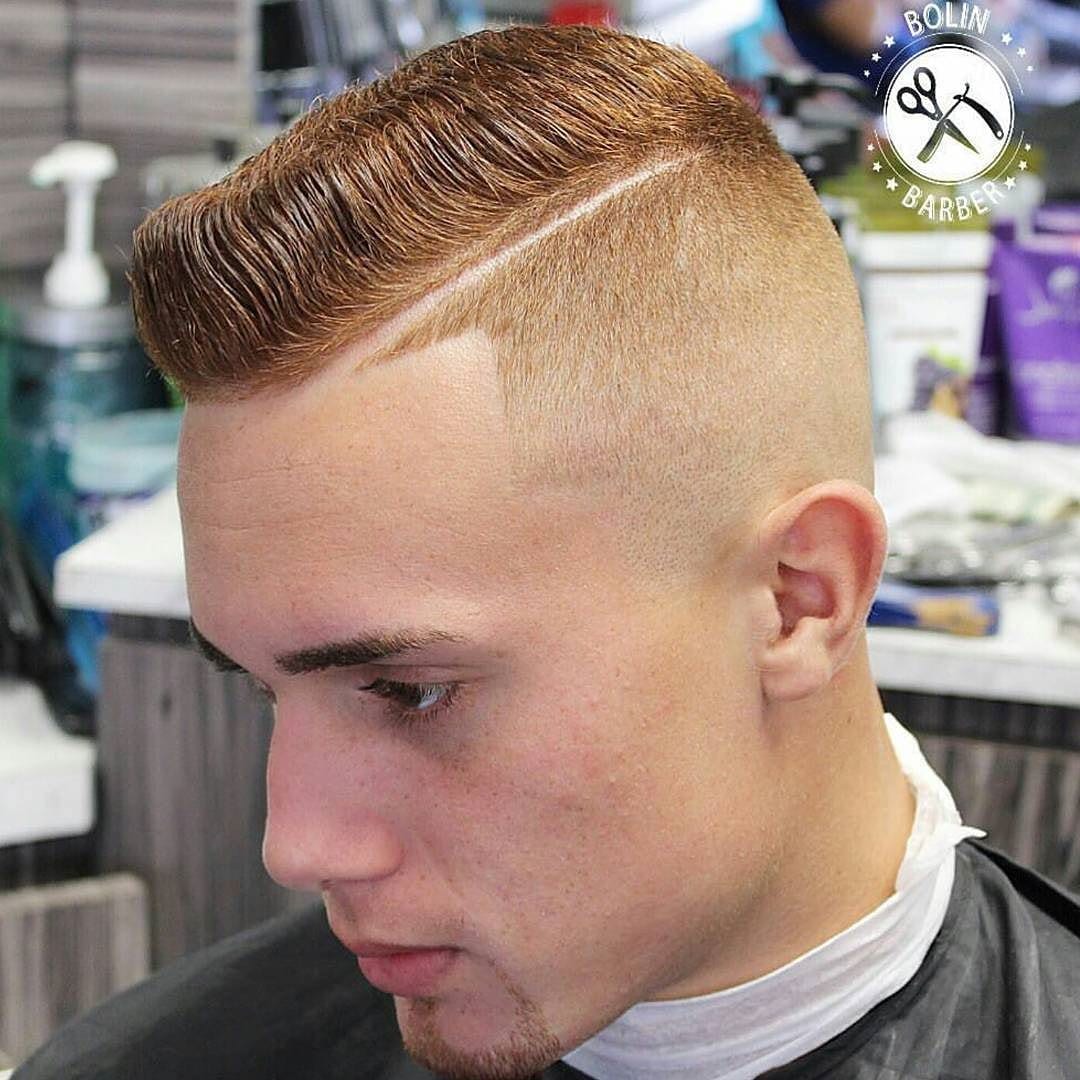 A man showing the side view of his Short slicked Pompadour with Hard Part - men's hairstyles