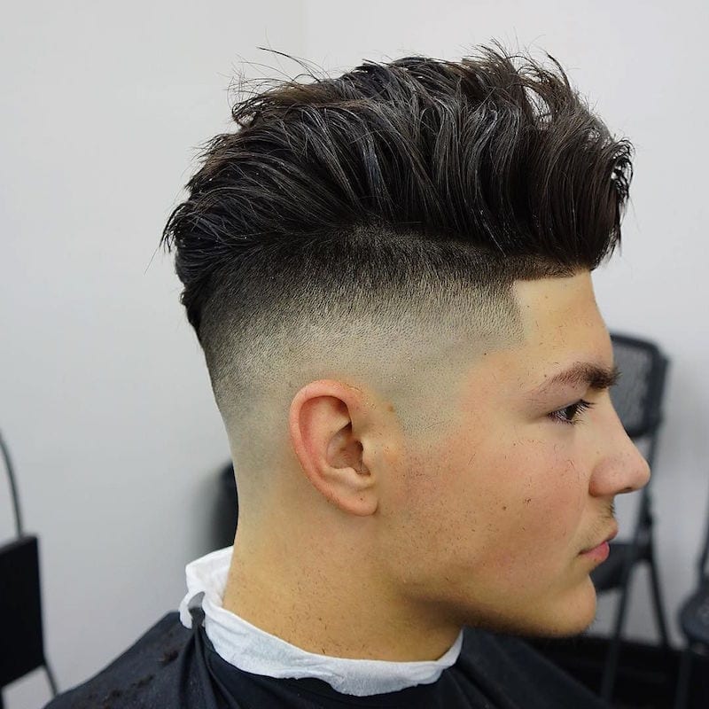 A boy showing the side view of his Medium Messy Undercut - Latest Hair Cut for Men and Boys