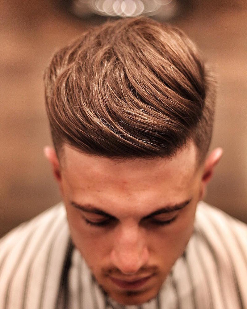A man showing his side quiff - Latest Hair Cut for Men and Boys