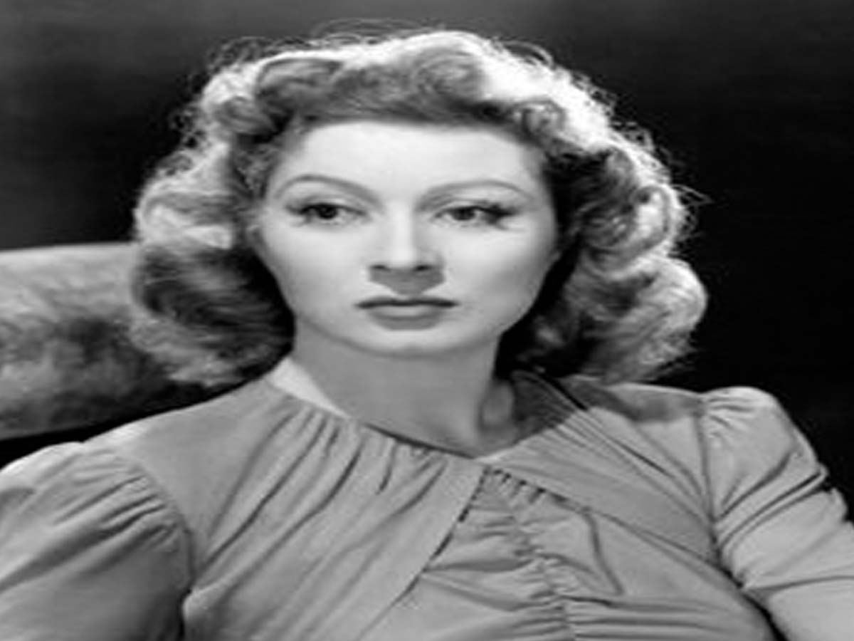 Greer Garson in grey dress - hollyywood actresses with curly hair