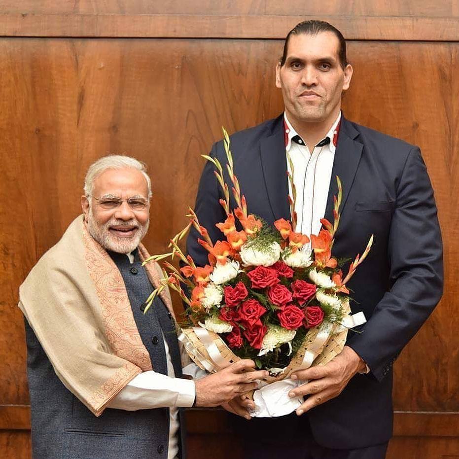 great khali with primer minister of India