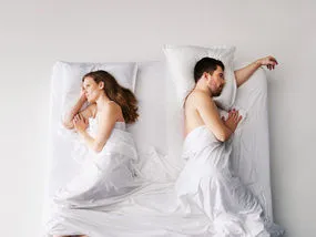 couple separate sleep