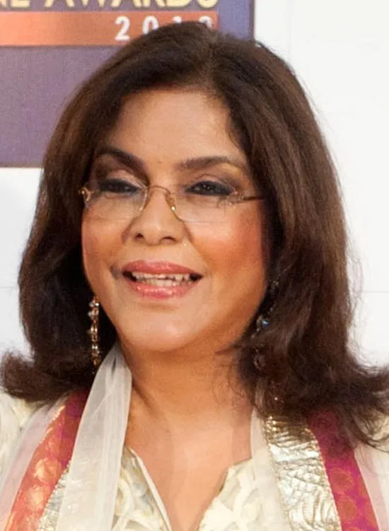 Zeenat Aman in white and pink suit with spectacles Zeenat Aman in white and pink suit with spectacles - Bollywood Actress Hairstyle