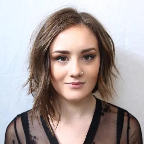 A woman in black see through dress and Asymmetrical Bob hairstyles A woman in black see through dress and Asymmetrical Bob hairstyles - daily hairstyles for medium hair