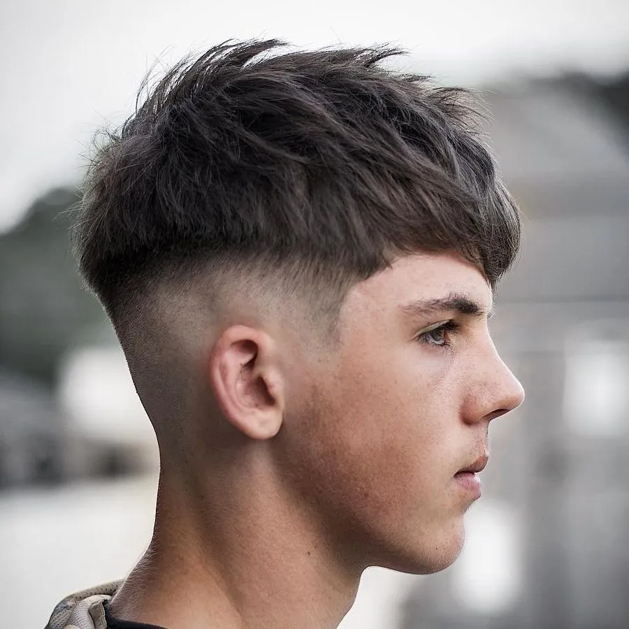 A man is showing the side view of his Bright Crop Hairstyle A man is showing the side view of his Bright Crop Hairstyle - hairstyles for Men 2022