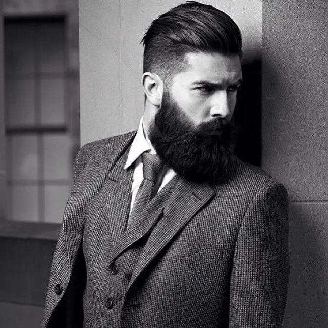 A man in grey suit showing the side view of his Brushed Back Hairstyle A man in grey suit showing the side view of his Brushed Back Hairstyle - latest hairstyles for men