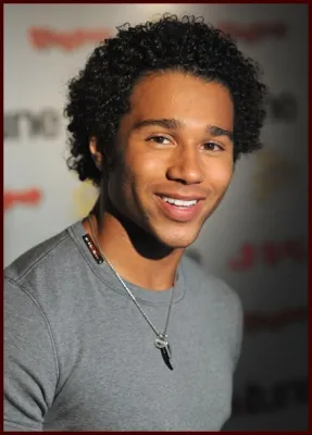 a smiling boy is showing his Defined Curls a smiling boy is showing his Defined Curls - Hairstyles For Boys