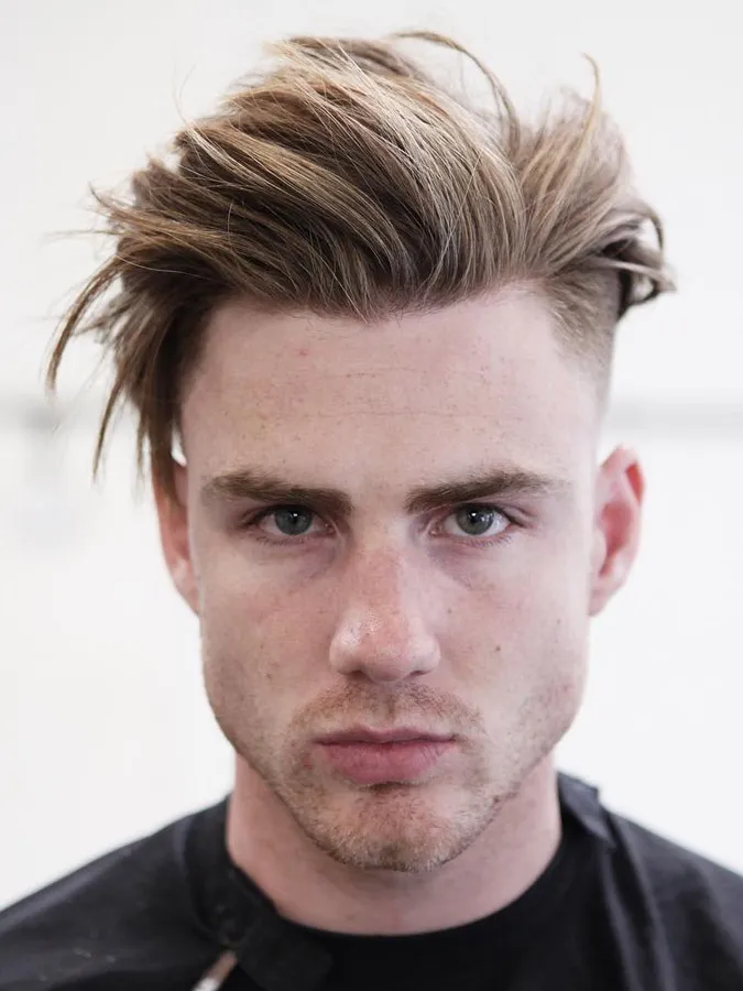 A man in black t-shirt showing his Dirty Hair Flow Hairstyle A man in black t-shirt showing his Dirty Hair Flow Hairstyle - hairstyles for Men 2022