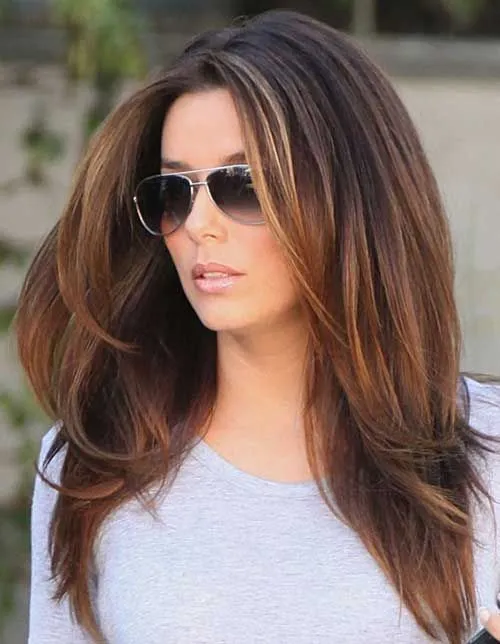 Woman in grey round neck t-shirt with goggles and Dual Layered Straight hairstyle Woman in grey round neck t-shirt with goggles and Dual Layered Straight hairstyle - haircuts for straight long hair