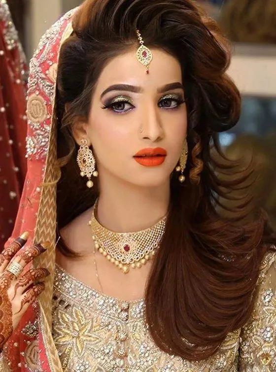 A girl in ping traditional lehenga with heavy jewellery showing her Flicked Ends A girl in ping traditional lehenga with heavy jewellery showing her Flicked Ends - long hair hairstyles