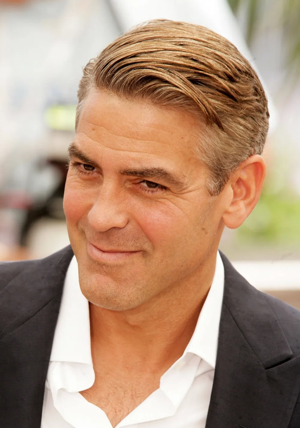 A man in grey coat and white shirt showing his Flowbee Hairstyle A man in grey coat and white shirt showing his Flowbee Hairstyle - haircuts for Men 2022