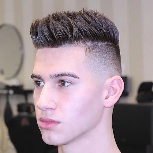 A man is showing his High Spiky Fade Hairstyle A man is showing his High Spiky Fade Hairstyle - latest haircuts for men