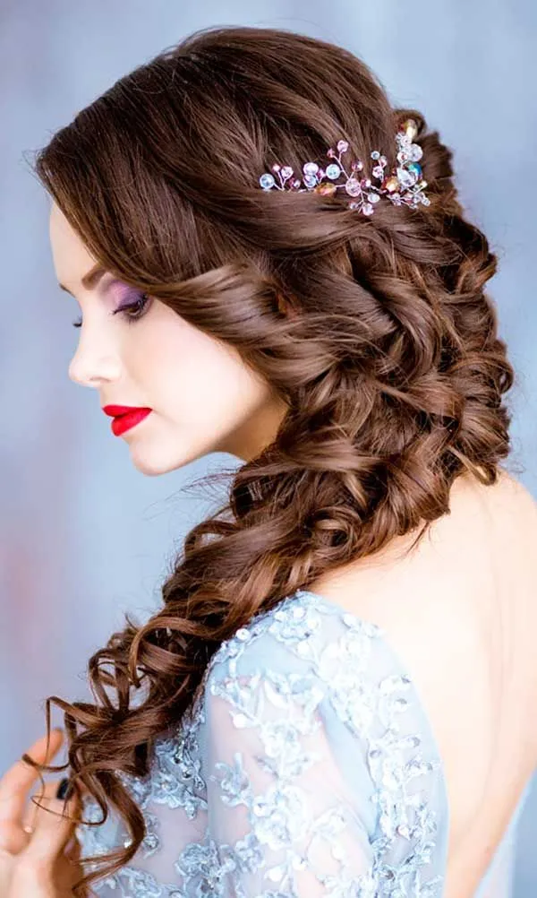 A girl in light blue deep back neck posing for camera and showing her High-Volume Long Hairstyle A girl in light blue deep back neck posing for camera and showing her High-Volume Long Hairstyle - hairstyle for long hair