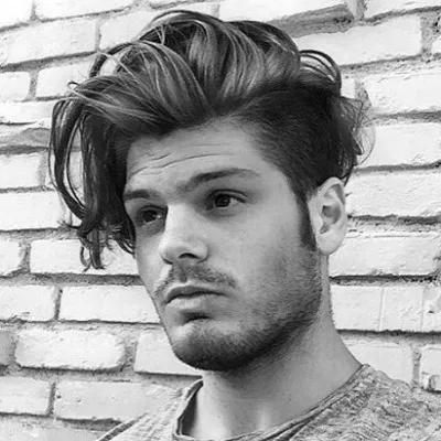 a boy is showing his Long Undercut a boy is showing his Long Undercut - latest Hairstyles for Boys