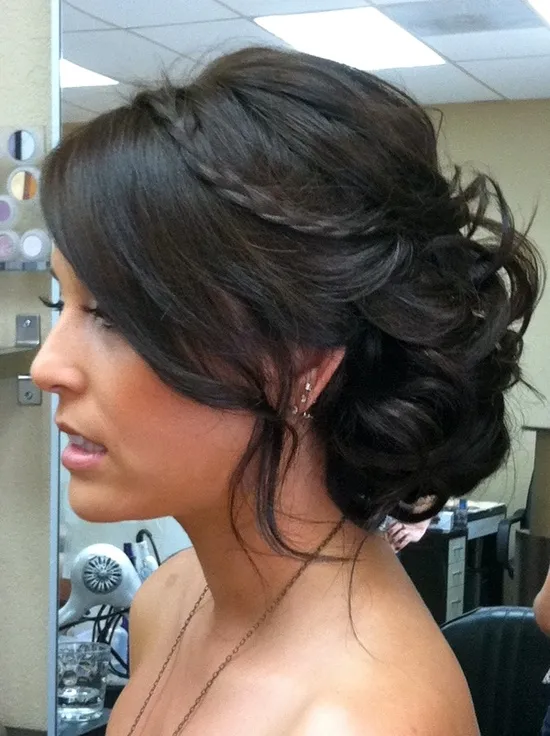 A girl in off shoulder dress showing the side view of her Messy Side Bun A girl in off shoulder dress showing the side view of her Messy Side Bun - bun hairstyles