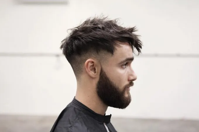 A man in showing the side view of his Mid Messy Hairstyle A man in showing the side view of his Mid Messy Hairstyle - hairstyles and haircuts for Men 2022