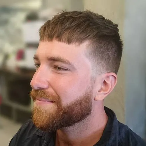 A man in black shirt showing his Short Messy Caesar Hairstyle A man in black shirt showing his Short Messy Caesar Hairstyle - latest hairstyles for men 2022