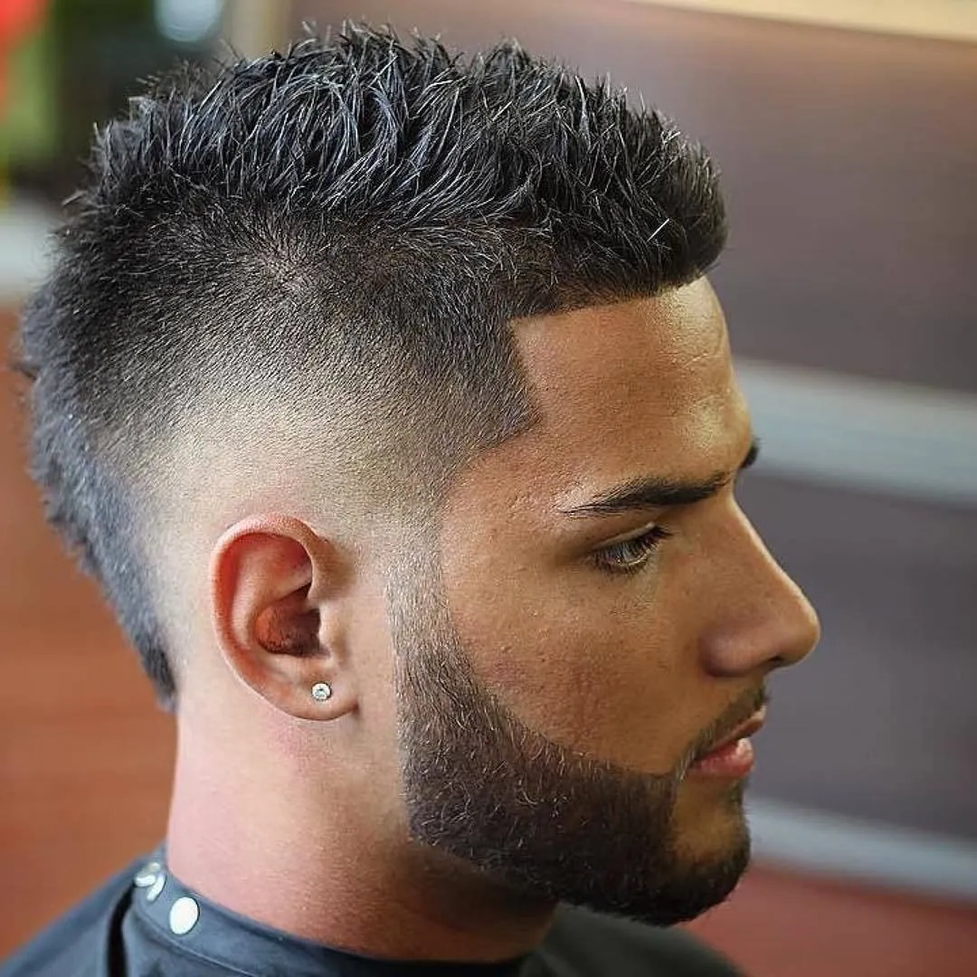 A man is showing the side view of his Side Fade Mohawk Hairstyle A man is showing the side view of his Side Fade Mohawk Hairstyle - hairstyle for Men 2022