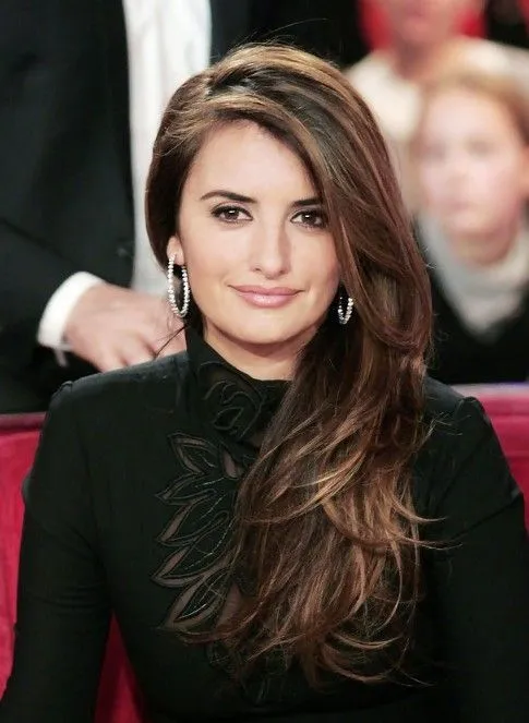 Woman in black dress with hoops earrings and Side Part Hairstyle  Woman in black dress with hoops earrings and Side Part Hairstyle - haircuts for straight long hair