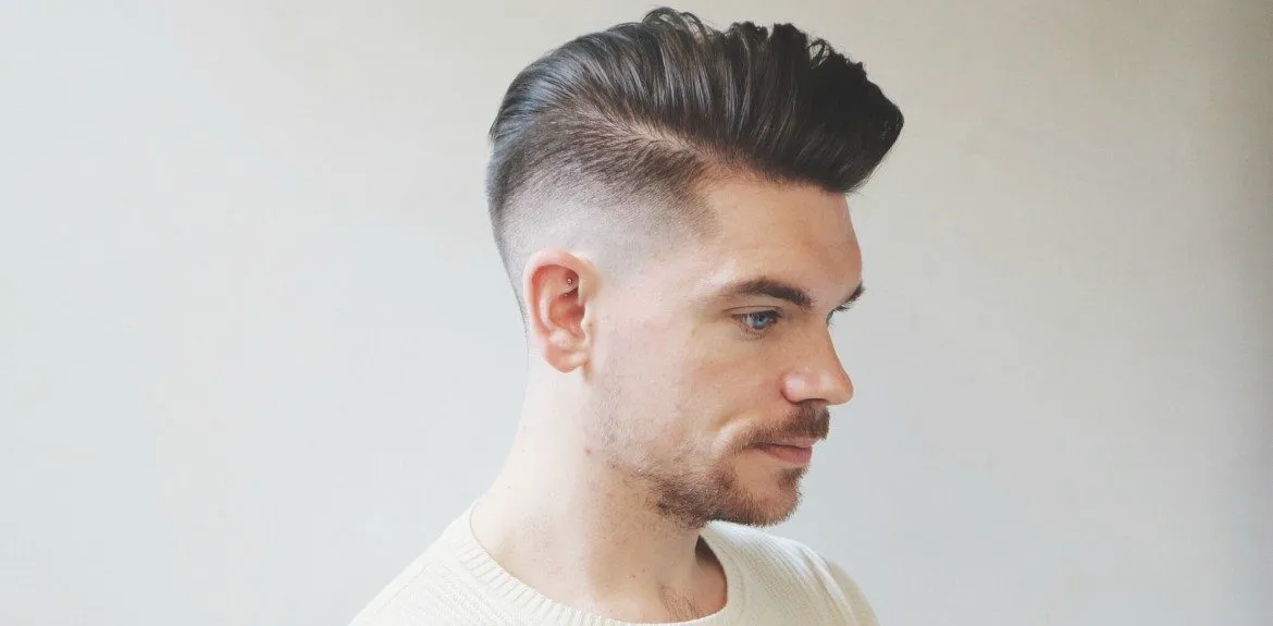A man in white t-shirt showing Side Pompador hairstyle A man in white t-shirt showing Side Pompador hairstyle - Hairstyle for Men 2018