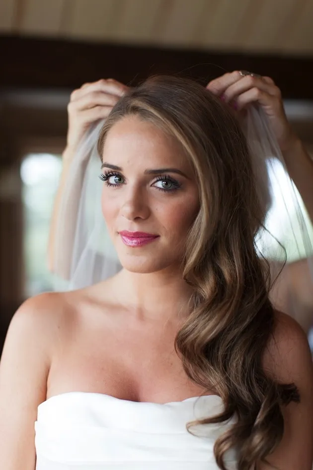 A girl in off shoulder dress showing her Side Swept Curl A girl in off shoulder dress showing her Side Swept Curl - bridal hairstyles