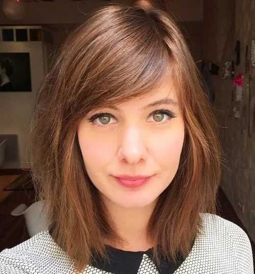 Unique Types of Hairstyles For Girls With Medium Hair 9 side swept bangs Hairstyles for Girls with Medium Hair