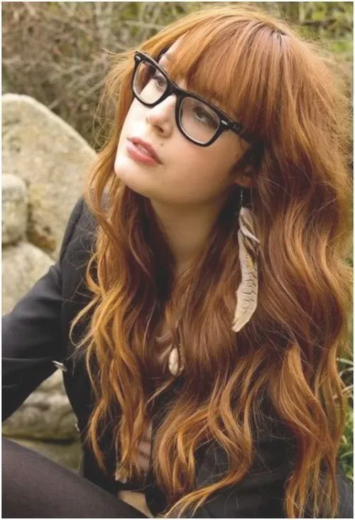 Woman in black suit with spectacles and Long Tousled Layers Woman in black suit with spectacles and Long Tousled Layers - hairstyle for long hair on jeans top