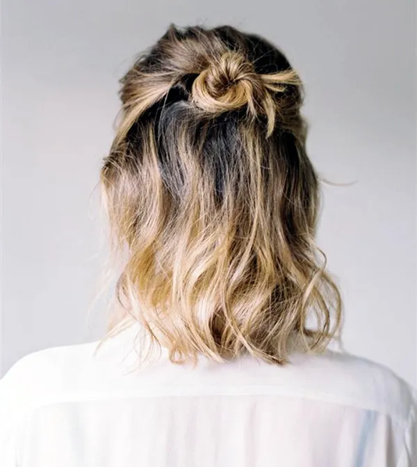 A girl in white shirt showing the back view of her Ombre Braid & Bun A girl in white shirt showing the back view of her Ombre Braid & Bun - short haircut Teenage Girls