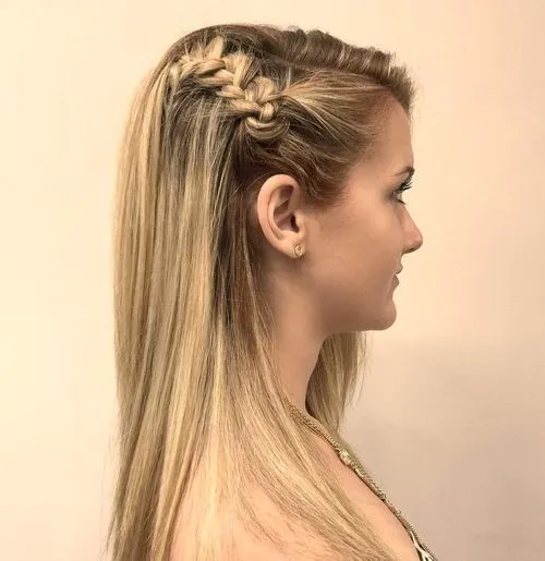 A girl in strappy dress showing the side view of her Shorter braided teenage style A girl in strappy dress showing the side view of her Shorter braided teenage style - haircut for Girls
