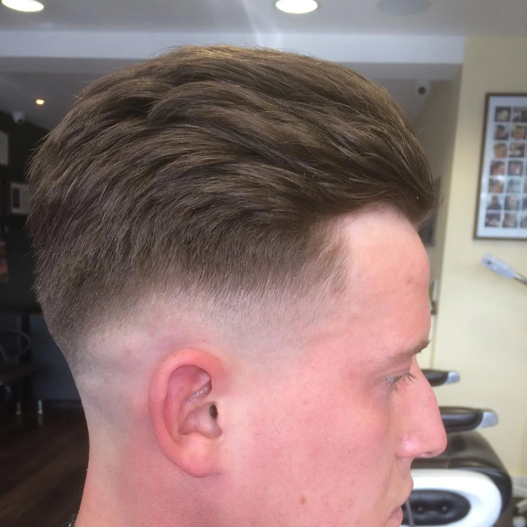 30 Short Latest Hairstyle for Men 2023 21 Sweep Back with Bald Fade Short Hairstyle for Men