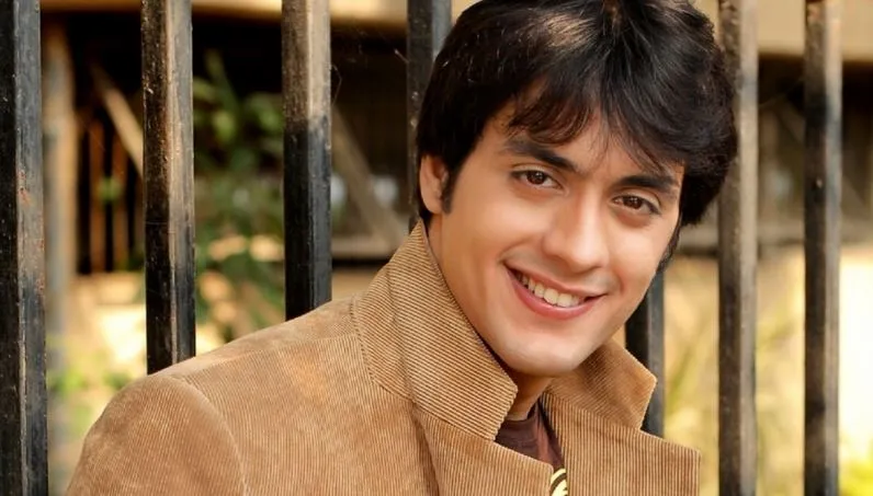 Gaurav S Bajaj in brown jacket smiling and posing for camera Gaurav S Bajaj in brown jacket smiling and posing for camera - Most Handsome Indian TV Actors