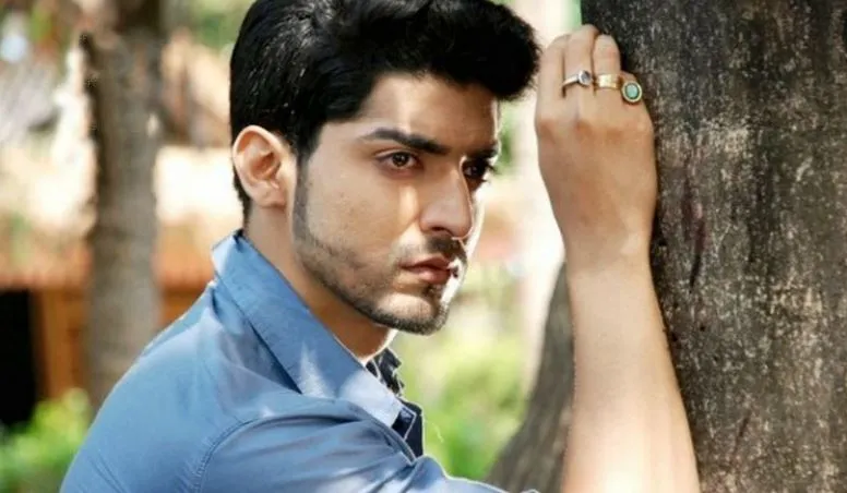 Gurmeet Choudhary in blue shirt giving a side look to camera  Gurmeet Choudhary in blue shirt giving a side look to camera - Most Handsome Indian TV Actors