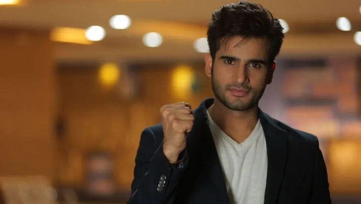 Karan Tacker in blue coat and white t-shirt Karan Tacker in blue coat and white t-shirt - Most Handsome Indian TV Actors
