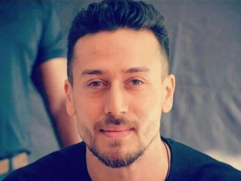 Tiger Shroff in black round neck t-shirt and Baaghi 2 hairstyle - Tiger Shroff Hairstyles