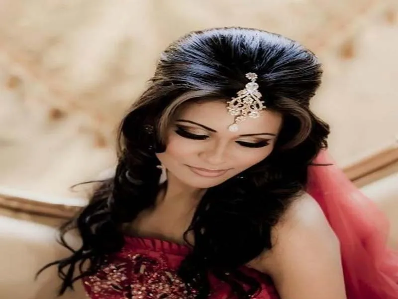 Woman in red traditional dress with Puff Hairstyles Woman in red traditional dress with Puff Hairstyles - hair cutting style for female with name