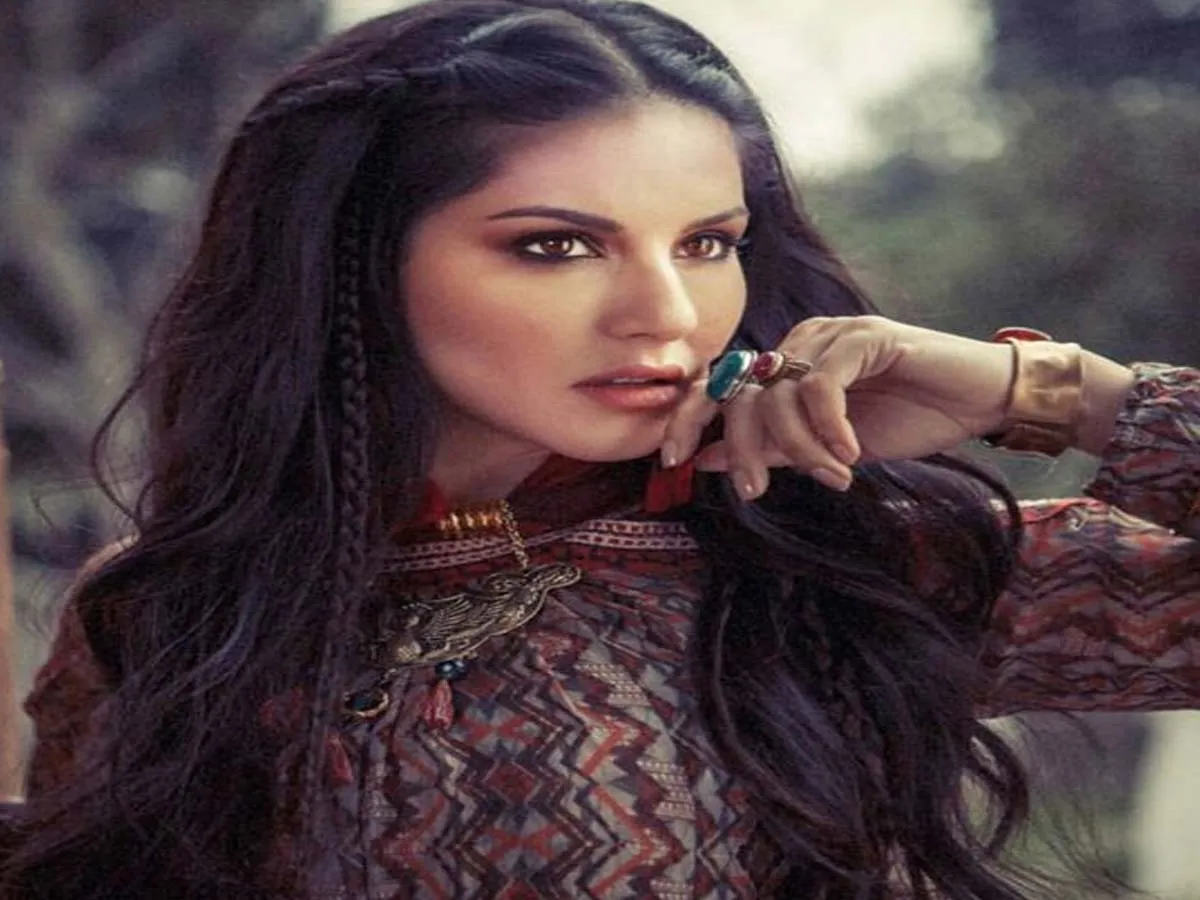 Sunny Leone in a multicolor dress with side braids - Sunny Leone Hairstyles