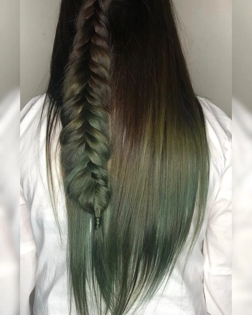 A girl is showing Army Green Hair color with back pose A girl is showing Army Green Hair color with back pose - trending hair color for women