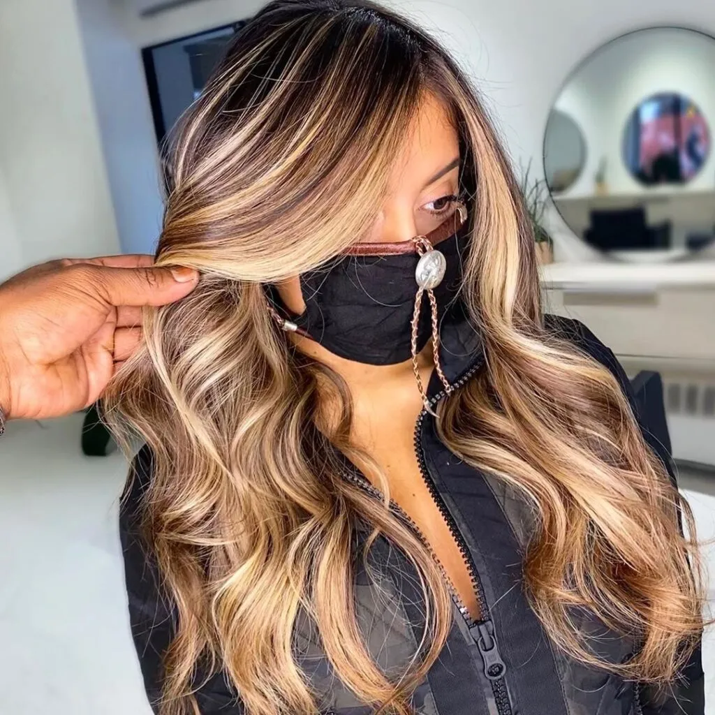 Girl in black leather jacket showing Caramel Blonde Hair color with front Pose Girl in black leather jacket showing Caramel Blonde Hair color with front Pose - dark blonde hair color