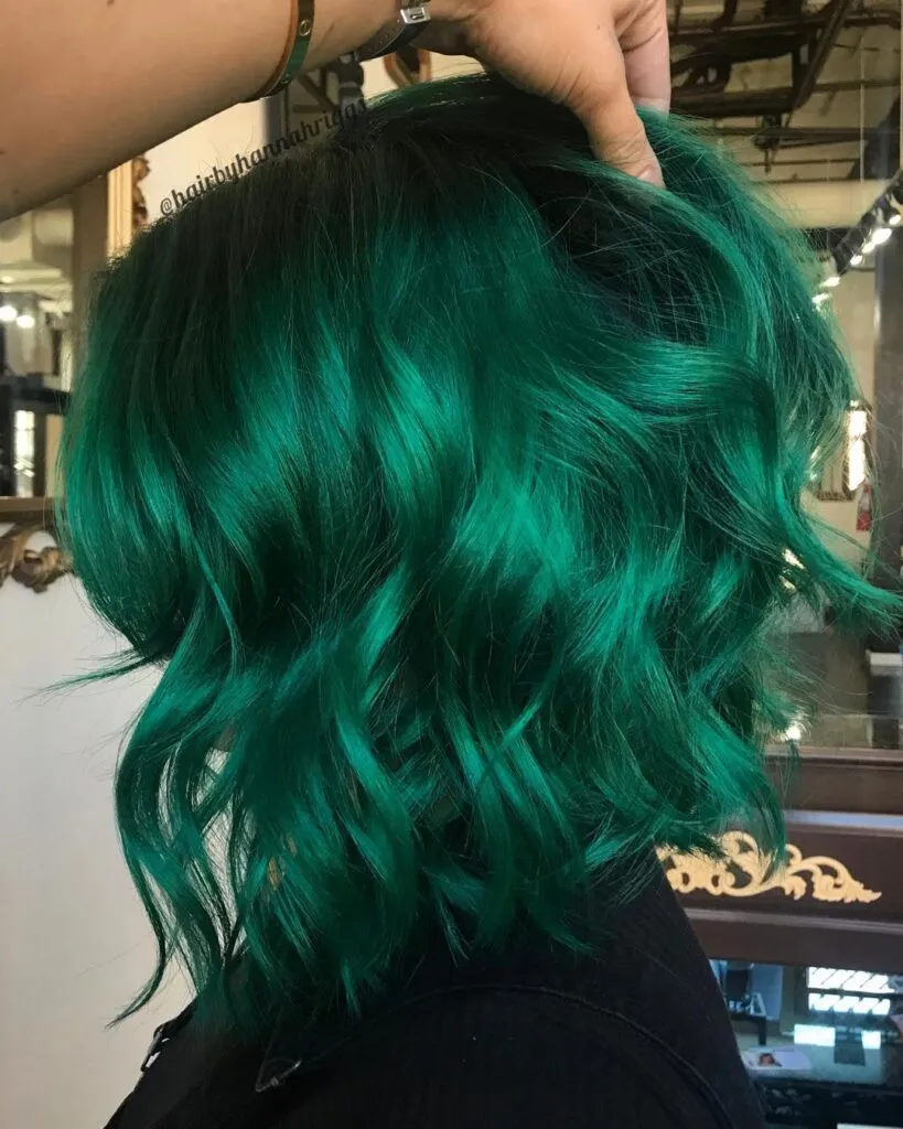 a girl in black top showing the side view of her emerald hair color a girl in black top showing the side view of her emerald hair color - latest green hair color ideas