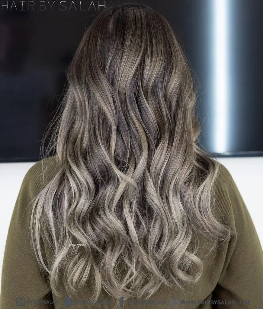 a girl in dark green Light Ash Blonde Hair color with back pose a girl in dark green Light Ash Blonde Hair color with back pose - hair color for women