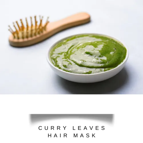 Paste of curry leaves and hibiscus petals in bowl with a hair brush - hair fall remedy