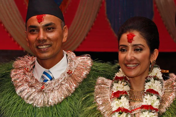 Manisha Koirala in wedding dress posing with husband Samrat Dahal Manisha Koirala in wedding dress posing with husband Samrat Dahal - celebrity divorce