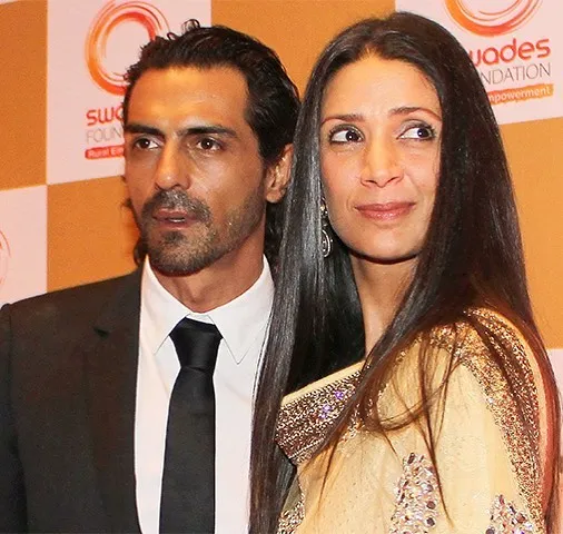 Arjun Rampal and his ex-wife Mehr Jesia posing for camera Arjun Rampal and his ex-wife Mehr Jesia posing for camera - bollywood actress divorce list