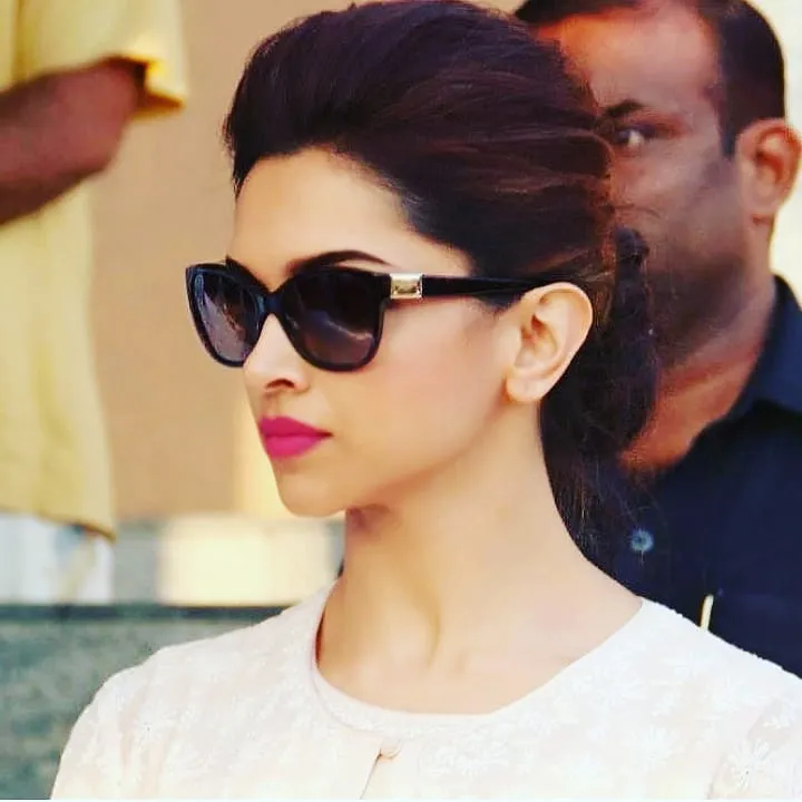 Deepika in white dress and puff buns, wearing black googles Deepika in white dress and puff buns, wearing black googles - deepika padukone hairstyles 2021,
