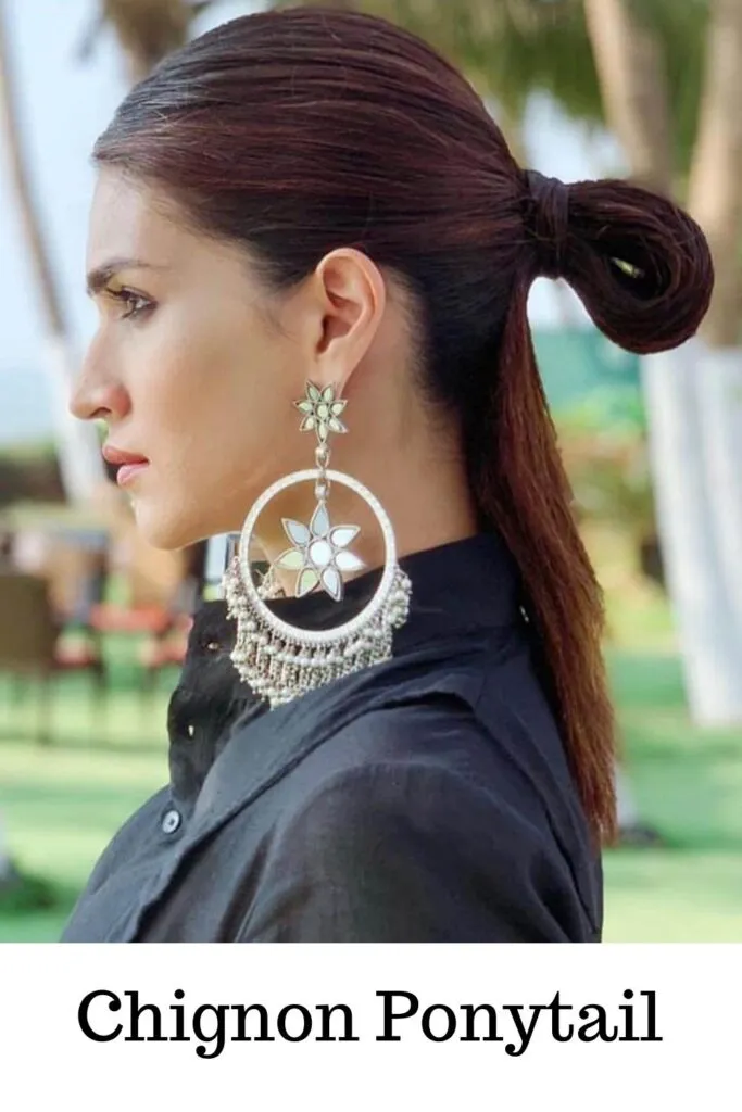 Kirti Sanon wearing danglers and chignon Ponytail - ponytail hairstyles for girls