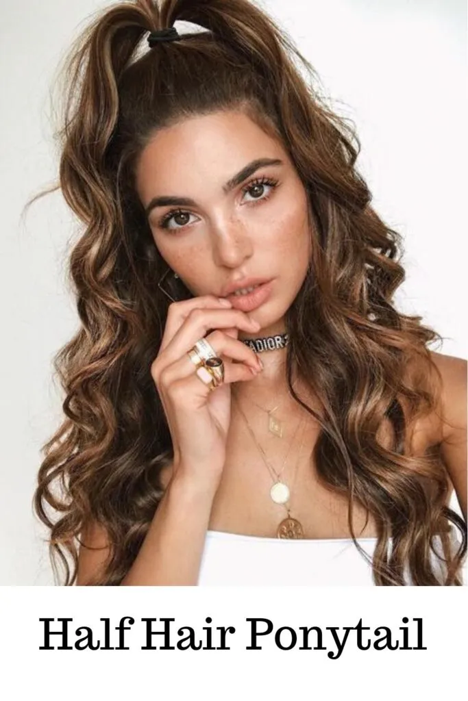  girl in colored hair showing her Half Hair Ponytail - ponytail curls hairstyles