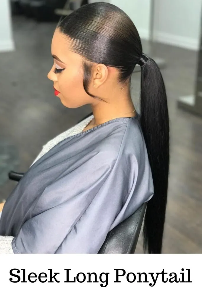 A woman in white and grey dress showing off her sleek long ponytail - ponytail extension for black hair