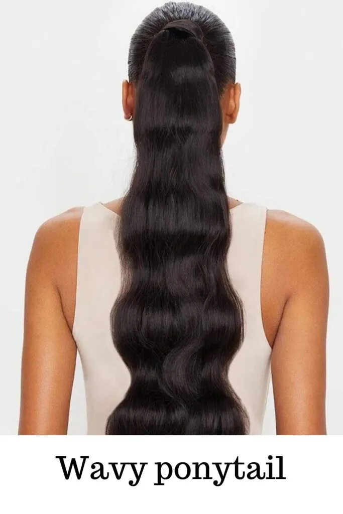 A lady in tank top showing her Wavy Ponytail - ponytail hair extensions online India